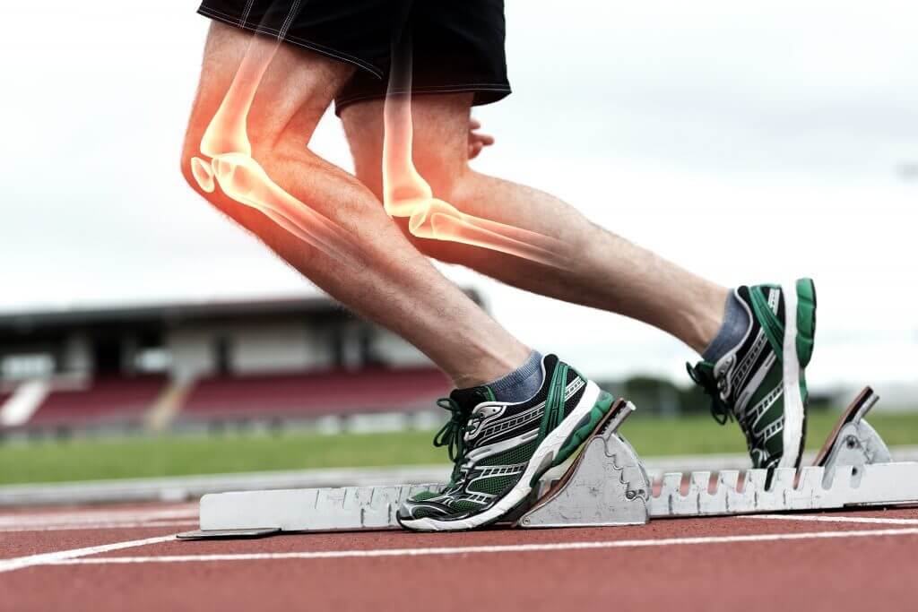 Runner with highlighted knee and ankle joints indicating a sports injury, treated at Triple H Osteocare on the Central Coast.